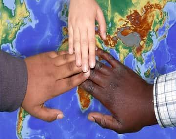 hands of different ethnic people representing Canada's Refugee and Asylum Program