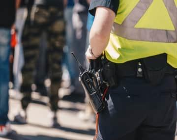 Canadian border security officer checking admissibility and issuing Temporary Resident Permit (TRP) if needed.